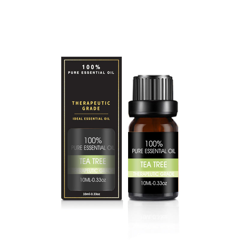 Aceite esencial de árbol de té con frasco y caja